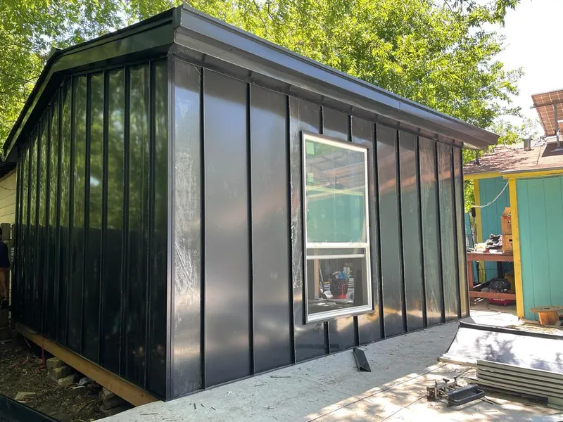 Black standing seam metal wall panels for Metal Roof Installation in Pebble Creek