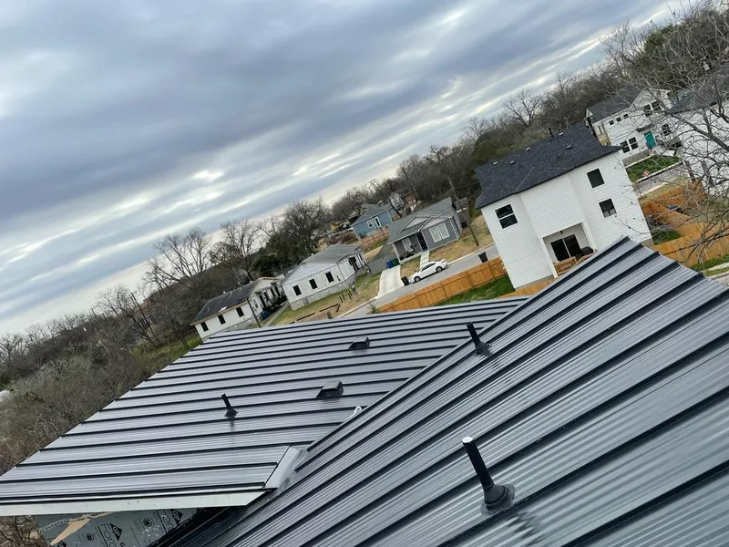 Standing seam metal roof panels with vents for Skylight Repair in Pebble Creek